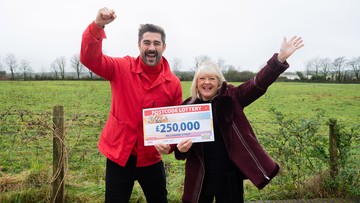 SPECIAL DELIVERY: Carol's joy at win, presented by ambassador Matt Johnson