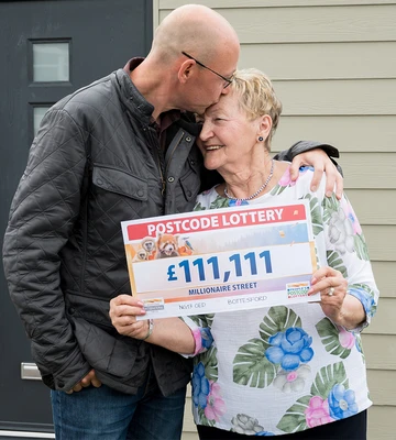Winner Olga congratulated by her son Paul