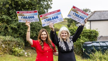 Judie and Catherine celebrating a triple win