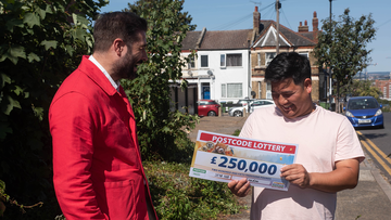 Milan collects his cheque for a whopping £250,000!