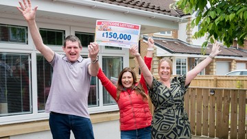 CHEQUE IT OUT: Nadene and Paul with Presenter Judie McCourt