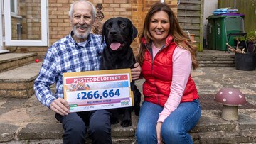 WON MAN AND HIS DOG: Malcolm celebrates quadruple windfall