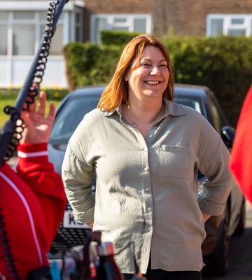 GRIN TO WIN: Natalie left for work before hubby Paul called her to come home