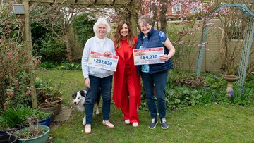 SMILES ALL ROUND: Jean and Gill with ambassador Judie