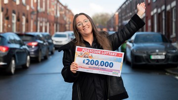 CHEQUE IT OUT: Buzzing Beth always said she'd land a Postcode Lottery win