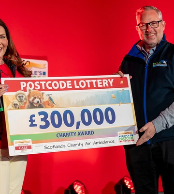 Air We Go: Presenter Judie presents SCAA chief exec David Craig with cheque