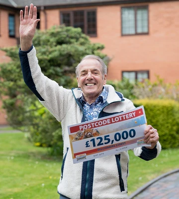 Grinning Graham plans to buy his dream car