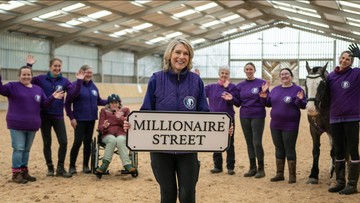 FOALS GOLD: Belvoir RDA's Lesley Davies, staff, volunteers and a wheelchair user