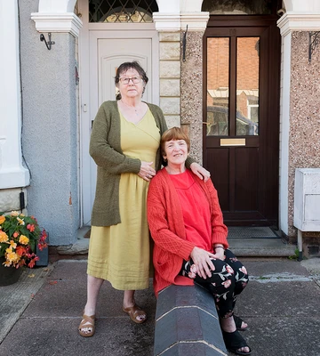 WHO DOORS WINS: Neighbour pals Gill (left) and Pauline are planning a postcode party