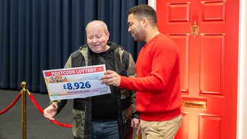 LATE WINNER: Danyl presented Chris with a cheque when he turned up last