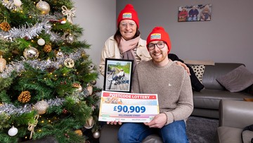 GRAN PRIZE: Luke and his mum Maria with a pic of his great-gran