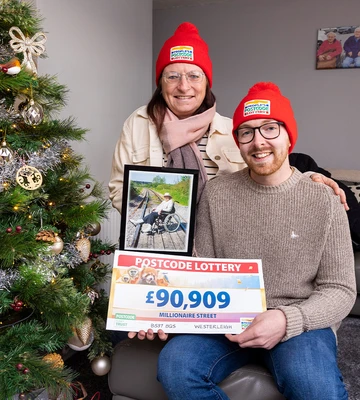 GRAN PRIZE: Luke and his mum Maria with a pic of his great-gran