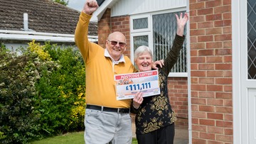 Geoffrey and wife Jenny celebrate after his £111,111 win