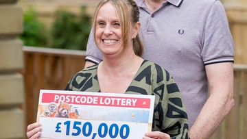 HUG OF LOVE: Nadene and Paul bagged their prize just days after their 30th wedding anniversary
