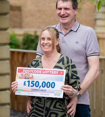 HUG OF LOVE: Nadene and Paul bagged their prize just days after their 30th wedding anniversary