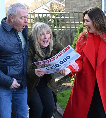 HAPPY TEARS: Lesley and hubby in shock