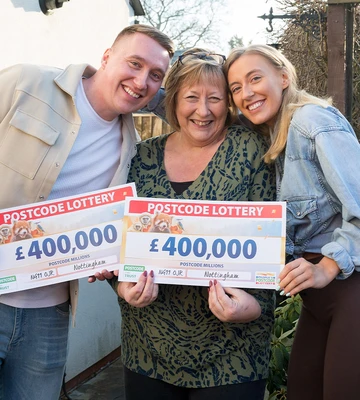SMILES ALL ROUND: Shirley with son Alex and daughter Rachel