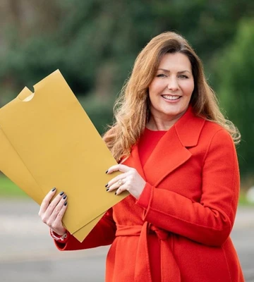 DOUBLE BUBBLE: Postcode Lottery's Judie McCourt surprised our £800k winner
