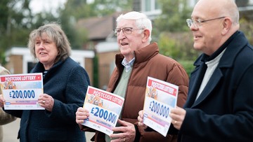 THREE IN A ROW: Next-door neighbours celebrate winning together