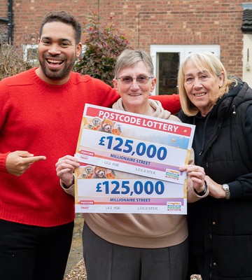 CHEQUE MATES: Pauline celebrates her win with pal Sharon and Danyl