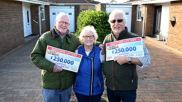 BUDDY AMAZING: Pals Mick (left), Valerie and David celebrate together