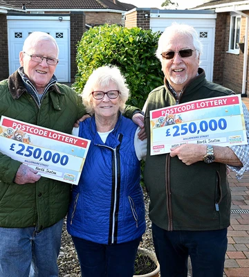 BUDDY AMAZING: Pals Mick (left), Valerie and David celebrate together