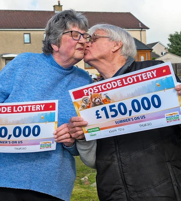 PECKING ORDER: James kisses wife Fiona after double win