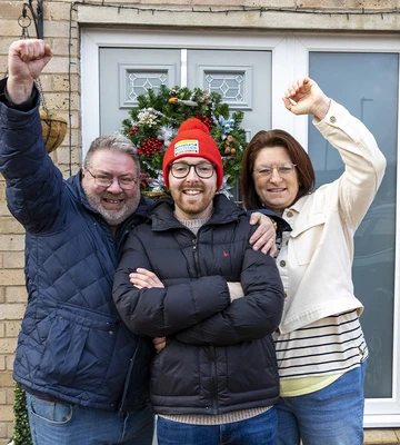 THREE'S A WOWED: Luke, mum Maria and dad Rob will share prize