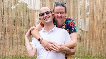 THAT'S MY BOY: Proud mum Lynette hugs winning son Kenny