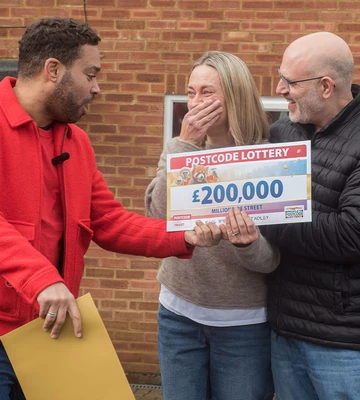 HAPPY TEARS: Winner Alistair and his wife Sally were emotional about their prize