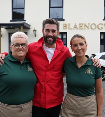 WELCOME: Bartenders Harriet Edwards and Natalie John with Presenter Matt Johnson