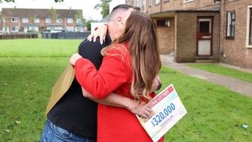 HUG IT OUT: Jonas comforted by presenter Judie after shock win