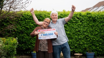 GARDEN PARTY: Delighted Angela and Billy celebrate on their back lawn