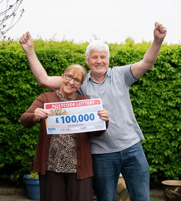 GARDEN PARTY: Delighted Angela and Billy celebrate on their back lawn