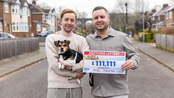 TWO BECOME WON: Ian and Ollie (left) with their pet dog, Dot