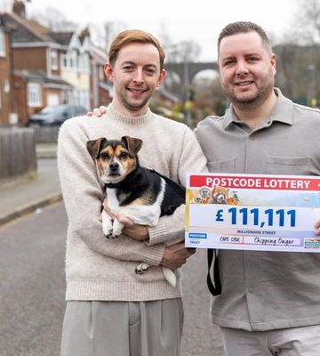 TWO BECOME WON: Ian and Ollie (left) with their pet dog, Dot