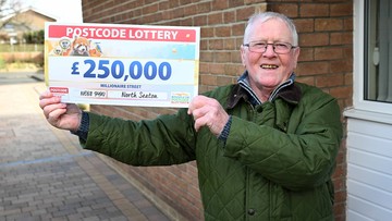 GOLD MINER: Retired pit worker Mick picks up wife's winning cheque