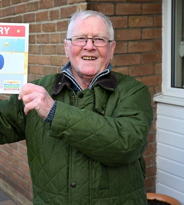 GOLD MINER: Retired pit worker Mick picks up wife's winning cheque