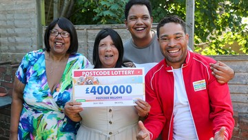 L-R Catherine, Celestina and Jack celebrating with Presenter Danyl Johnson