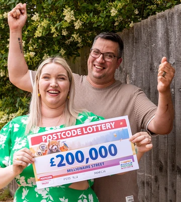 GLEE FOR TWO: Sally and hubby Jonny's joy at win