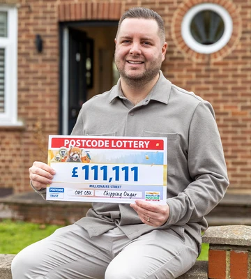 WALL I NEVER: Ian with his winnings