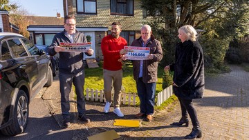 HIT FOR SIX: Bob, David and wife Nicola with lottery ambassador Danyl Johnson