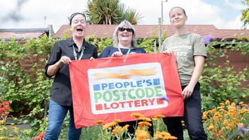 GROWING FOR GOLD: Charity team's delight at Postcode Lottery boost