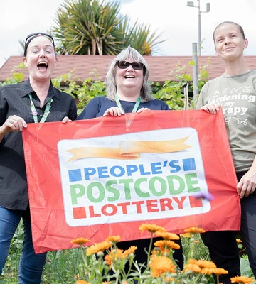 GROWING FOR GOLD: Charity team's delight at Postcode Lottery boost