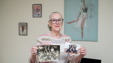 Victoria holds up photos of her dance classes from 1947 and 2022
