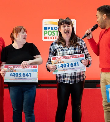 STUNNED: Michelle (2nd left) and Christina's six-figure reactions