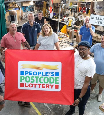 POSITIVE FUTURES: Making It Out team celebrate funding