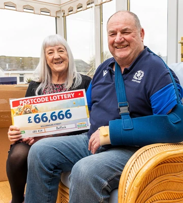 SMILES BETTER: Happy Tommy with his wife Maureen