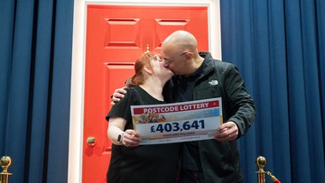 KISS AND MADE UP: Happy couple Michelle and Brett celebrate their win