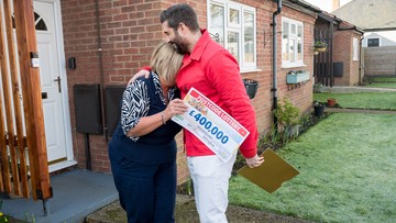 OVERWHELMING: Mandy sobs in the arms of Lottery's Matt Johnson